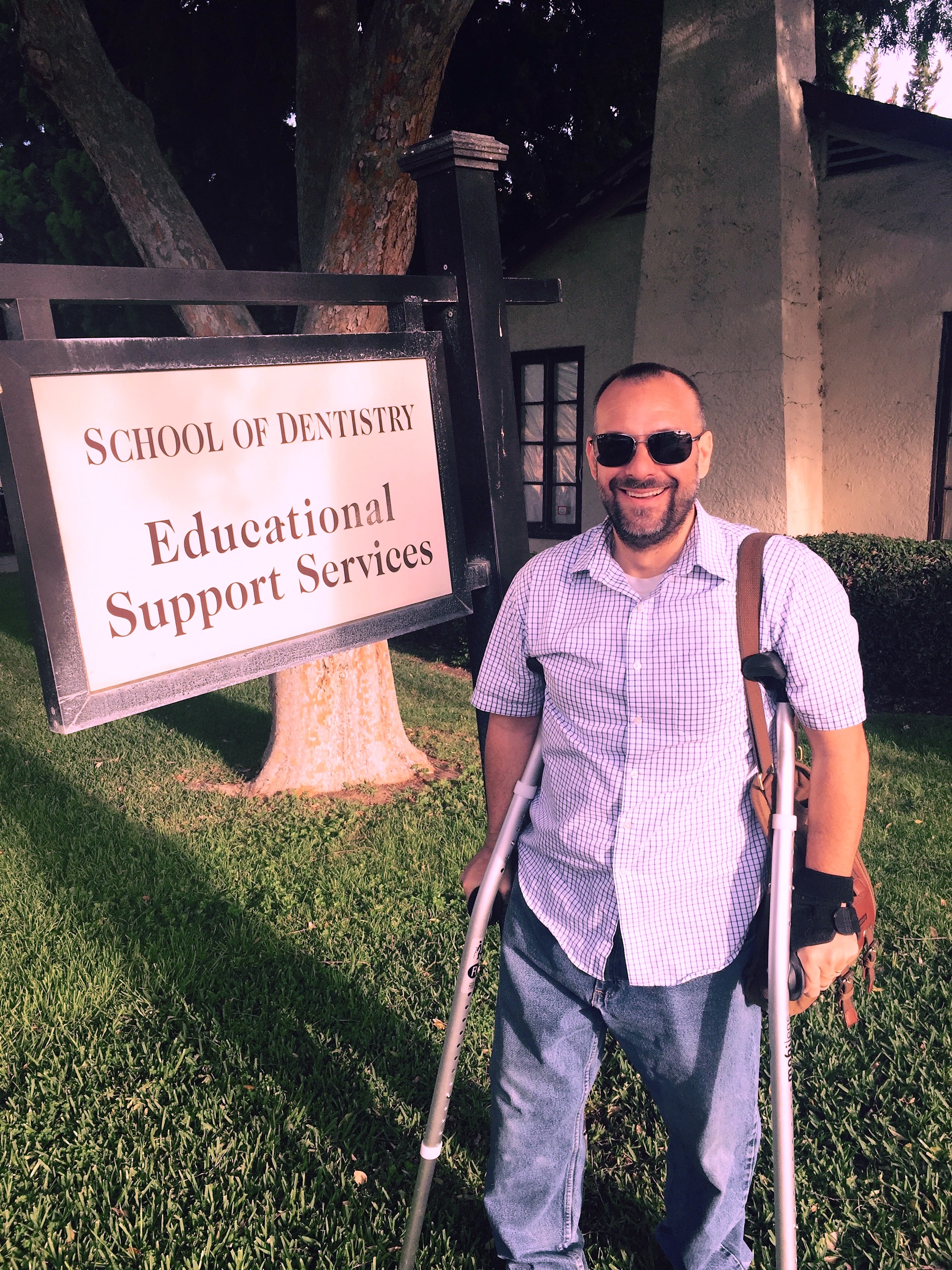 Joe returning to work for the first time after the accident, on crutches